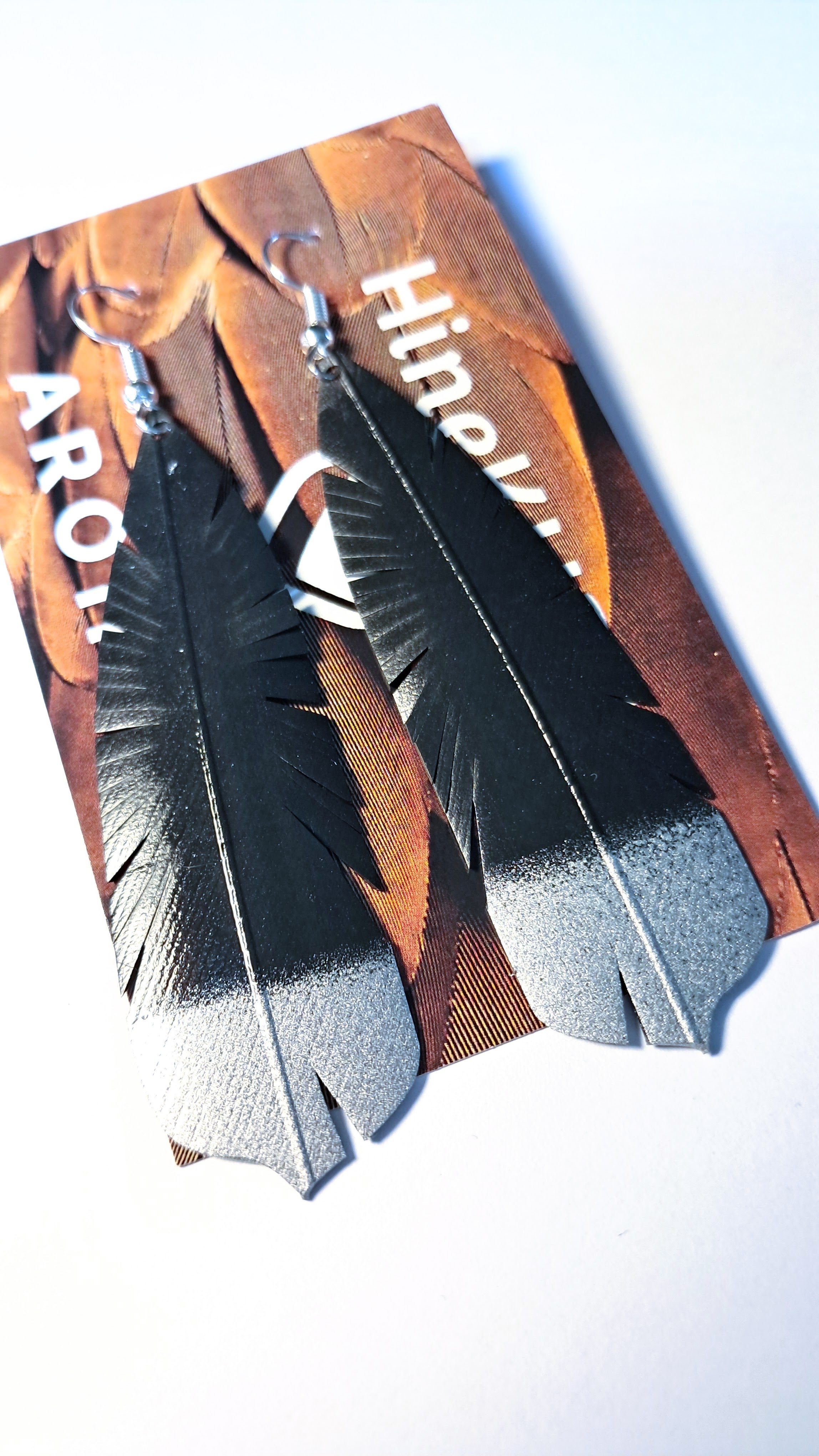 HineKURA - Huia - white, gold and silver