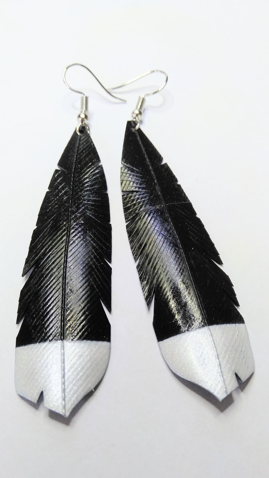 HineKURA - Huia - white, gold and silver